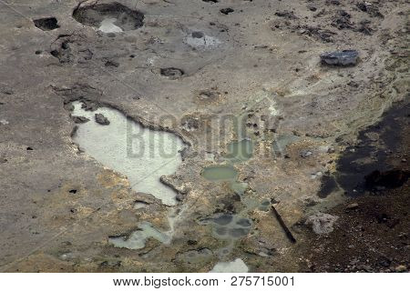 Sulphur Cauldron Bubbling And Steaming In Yellostone National Park, Wyoming