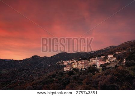Dramatic Pink And Orange Sunset Over The Mountain Villages Of Costa And Belgodere In The Balagne Reg
