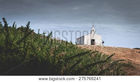 Tourists Visiting The Surroundings Of La Meule Chapel Near Island Of Yeu