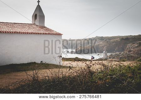 Tourists Visiting The Surroundings Of La Meule Chapel Near Island Of Yeu