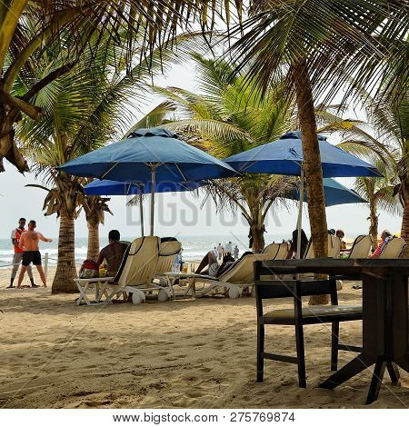 Relax On A Stunning Beach Under Palm Trees. Exotic Resort. Sun Beds And Umbrellas. Sweet Memories Ab