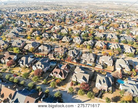 Top View New Development Residential Neighborhood And Urban Sprawl At Morning Fall Light