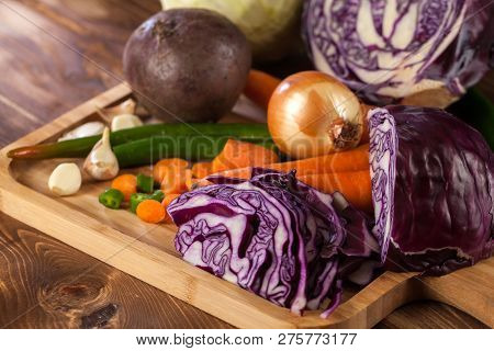 Verious Fresh Vegetables On A Wooden Table, Healthy Food
