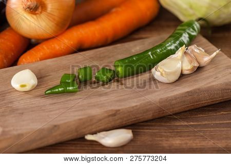 Verious Fresh Vegetables On A Wooden Table, Healthy Food