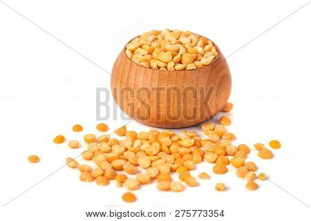 Dry Yellow Peas On Wooden Bowl Isolated On White Background