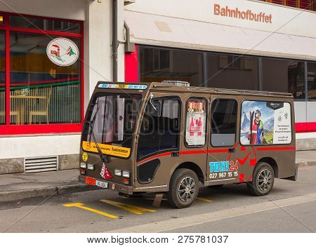 Zermatt, Switzerland - September 16, 2018: An Electric Taxi Parked On A Street In The Town Of Zermat