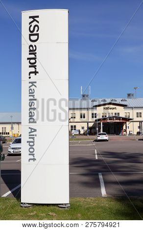 Karlstad, Sweden - May 26, 2016: Karlstad Airport Sign In The Foreground With The Terminal Building 