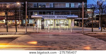 Swindon, Uk - December 27, 2018: Swindon Railway Station In Wiltshire At Night With Light Trails