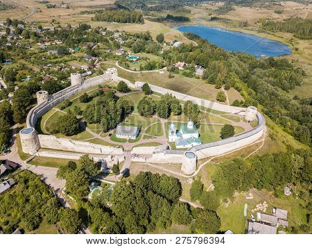 Izborsk Medieval Russian Fortress - Kremlin - With A Church. Aerial Drone Photo. Near Pskov, Russia.
