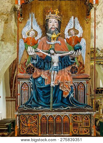 A Woodden Sculpture Of The Holy Trinity In Sankt Olofs Church, Built In The 1200s. Sankt Olof, Swede