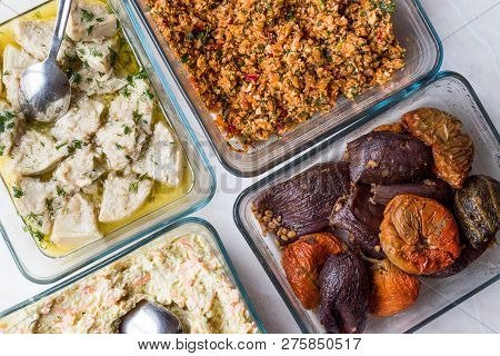 Turkish Food With Olive Oil Kisir, Dolma, Artichoke, Broad Beans And Carrot Salad With Yogurt.