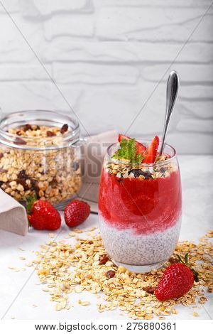Chia Pudding With Strawberry Sauce Homemade Granola On White Rusic Background