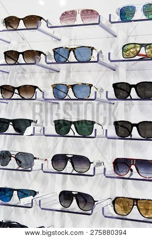 Sunglasses For Sale, Placed On The Shelves, Vertical Formation