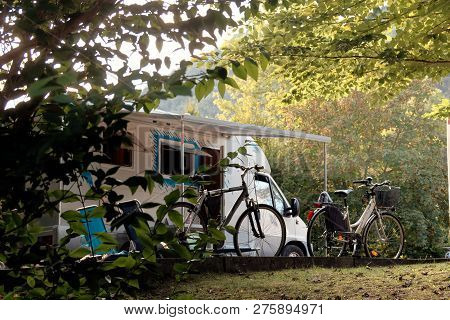 Barcis, Pordenone, Italy A Picturesque Place Camping Tourist Parking By Cars And Bicycles.