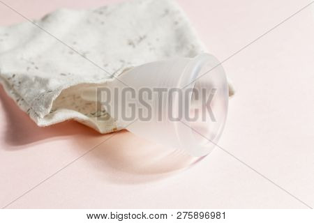 Close Up Of Woman Hand Folding Menstrual Cup Showing How To Use, C Form. Women Health Concept, Zero 