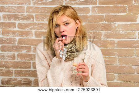Take Medications To Reduce Fever. Woman Tousled Hair Scarf Hold Glass Water And Tablets Blister. Wha
