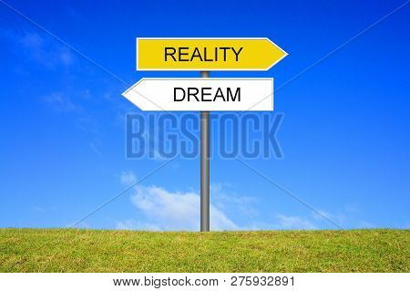 Signpost Outside Is Showing Dream Or Reality