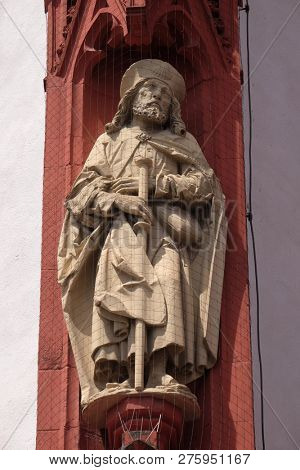 WURZBURG, GERMANY - JULY O4, 2018: Saint James the Apostle statue on the portal of the Marienkapelle in Wurzburg, Bavaria, Germany
