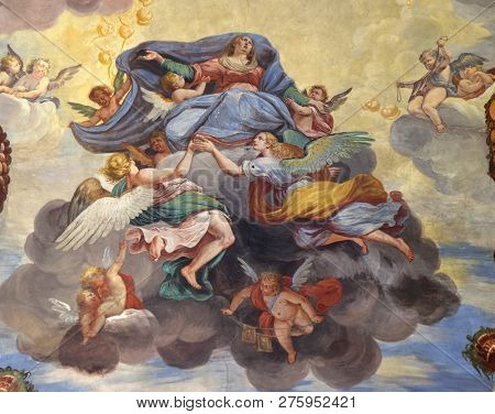 LUGANO, SWITZERLAND - JUNE 24, 2018: Assumption of the Virgin Mary, fresco of the vault of Marco Antonio Pozzi in the Saint Roch church in Lugano, Switzerland