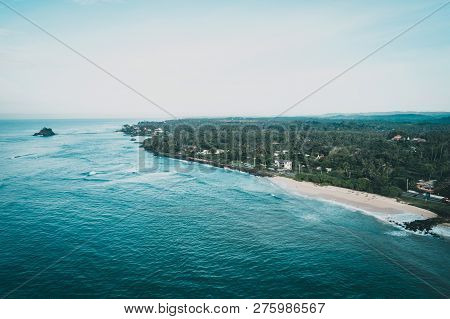 Aerial View Of Beautiful Tropical Coastline And Fisherman Village