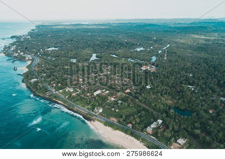 Aerial View Of Beautiful Tropical Coastline And Fisherman Village