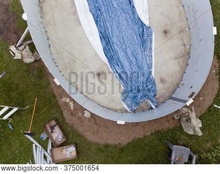 Aerial View Of Maintaing Above Ground Swimming Pool