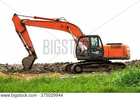 Excavator Backhoe On The Ground Isolated On White Background With Clipping Path