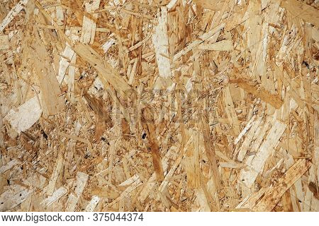 Pressed Wooden Panel Background. Osb Wood Board.