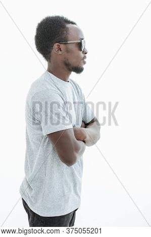 Side View. Handsome Guy In Sunglasses Looking Forward