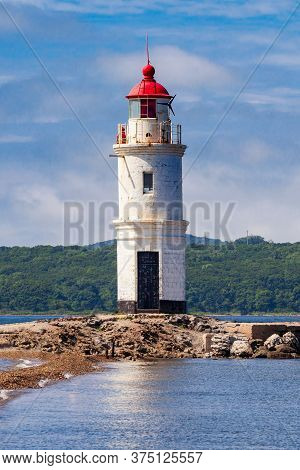 Lighthouse Tokarevskiy Egersheld On Tokarevskaya Koshka Cape In Vladivostok, Primorsky Krai In Russi