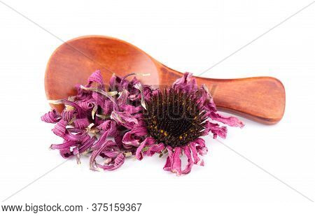 Dried Echinacea Flowers On Wooden Spoon, Isolated On White Background. Petals Of Echinacea Purpurea.