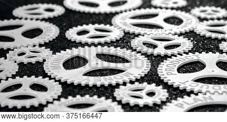 Several Gears With Different Inscription. Topic Of Finance. In Focus Money Product