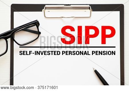 Paper With Self-invested Personal Pension Sipp On A Table