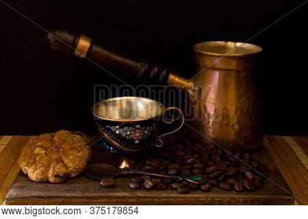 Cup Of Turkish Coffee Accompanied With Cookies And Coffee Beans
