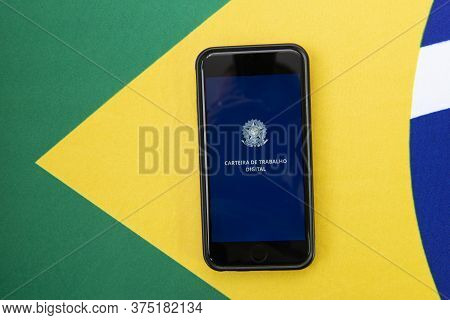 Florianopolis, Brazil, June 27, 2020: Top View Digital Work Card (carteira De Trabalho Digital) On B