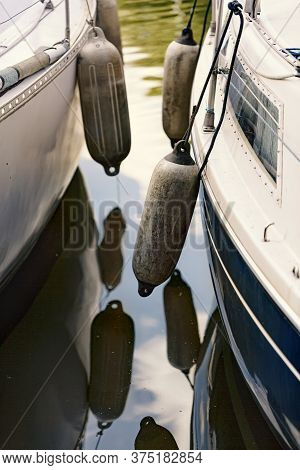 Yacht Fenders Attached To Board, Close Up