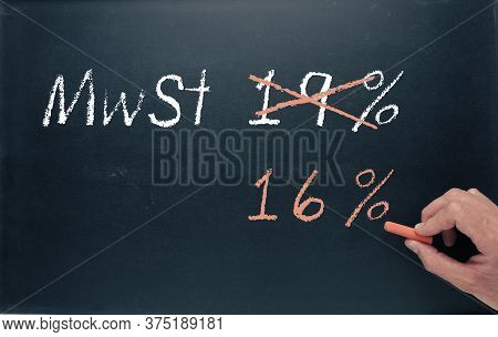 Conceptual Image With A Man Writing On A Chalkboard For Economic Stimulus Package For Germany.