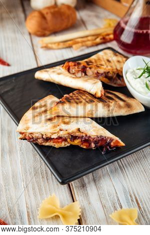 Closeup On Quesadilla With Tomato Tortilla Fajito Chicken And Mozzarella Cheese, Vertical