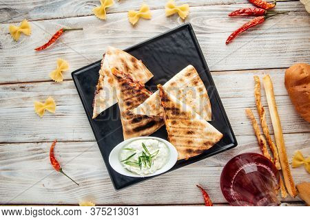Top View On Quesadilla With Tomato Tortilla Fajito Chicken And Mozzarella Cheese, Horizontal