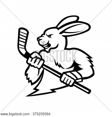 Black And White Illustration Of Head Of A Hare, Jackrabbit Or Rabbit Ice Hockey Player Holding An Ic