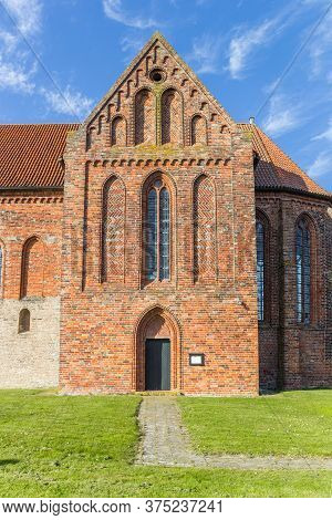 Door And Facade Of The Historic Stefanus Church In Holwierde, Netherlands