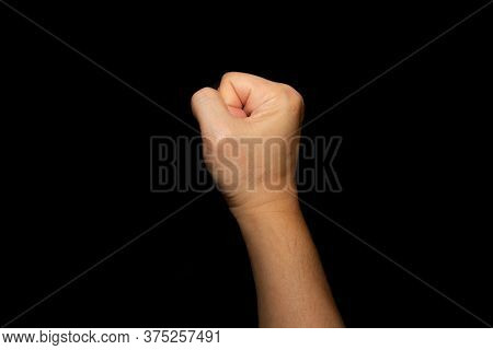 The Fists Of The Right Hand Show Signs Of Strength Or Zero.