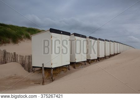 The Closed Beach Huts. The Beach In Hargen Aan Zee In Netherlands Without Foreign Tourists After The