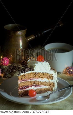 Portion Of Vanilla And Cream Cake On Ceramic Plate