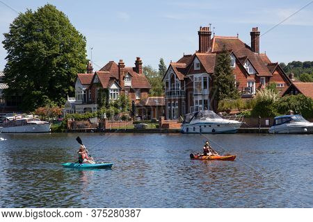 Canoeists On The Thames At Marlow In Buckinghamshire In The Uk Taken 20th May 2020