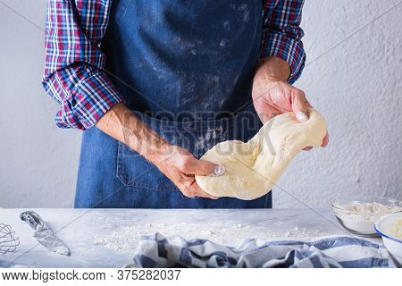 Baking, Eating At Home, Healthy Food And Lifestyle Concept. Senior Baker Man Cooking, Kneading Fresh