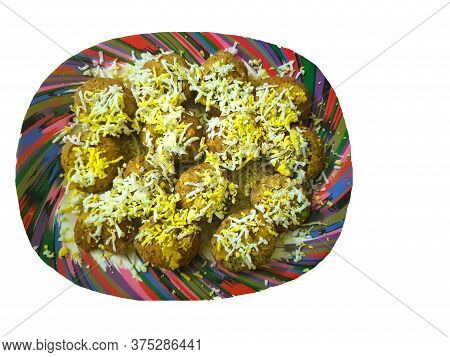 Panipuri - Traditional Indian Street Food Made Of Chickpeas And Potato With Egg On Top Served On A P