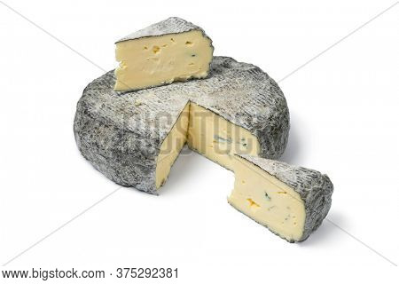 Fresh French Rochebaron cheese and pieces isolated on white background