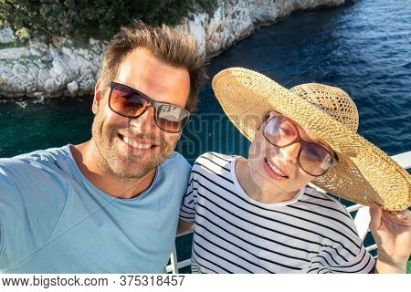 Beautiful, Romantic Caucasian Couple Taking Selfie Self Portrait Photo On Summer Vacations Traveling