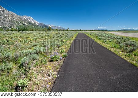 The Paved, Multi-use Pathway In Grand Teton National Park. Used For Biking And Walking In The Wyomin